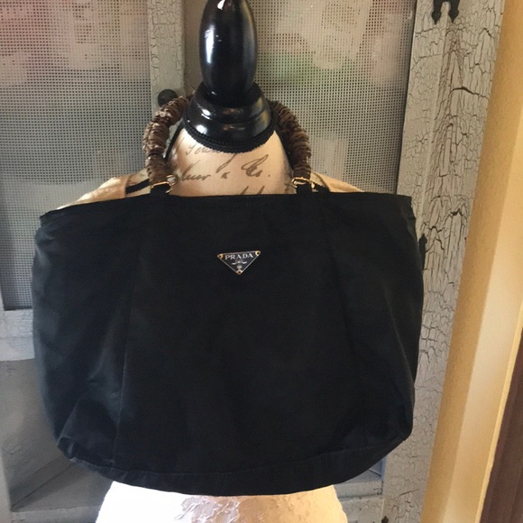 Prada Handbags - Prada black logo tote with decorative handles